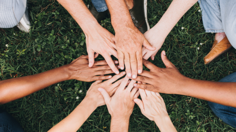 hands coming together